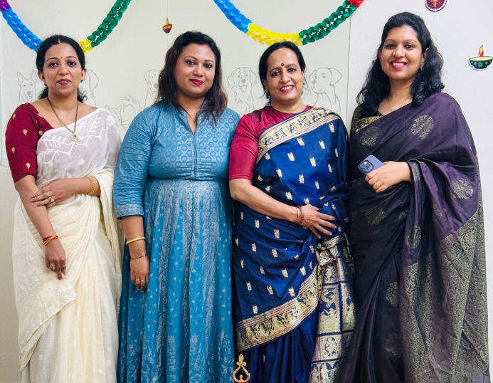 The four women directors of Hunger Tail standing together in traditional attire, celebrating leadership, innovation, and the spirit behind a proudly women-led pet food brand in India